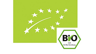 Logo des EU-Bio-Siegels. Grüner Hintergrund mit weißen Sternen, rechts unten ein Sechseck mit dem Wort Bio.